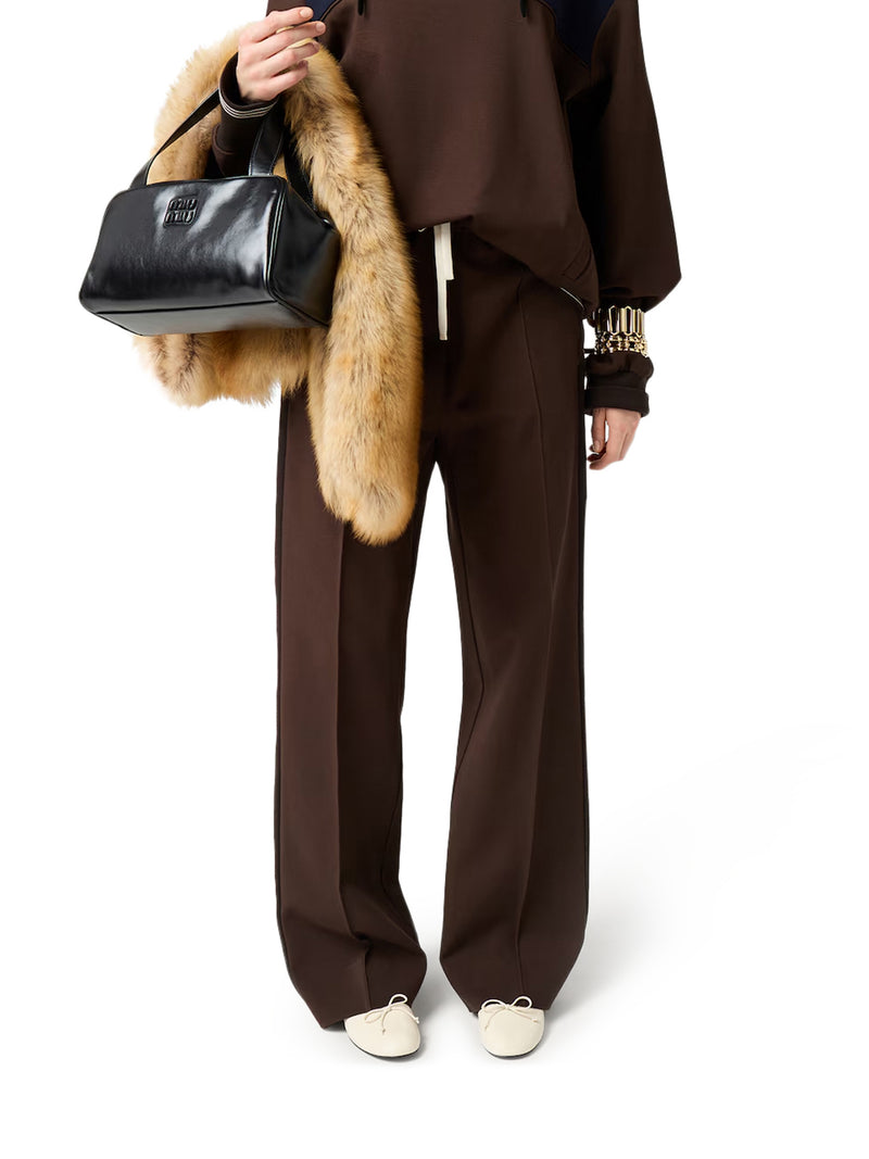 KNIT TROUSERS WITH FABRIC STITCH