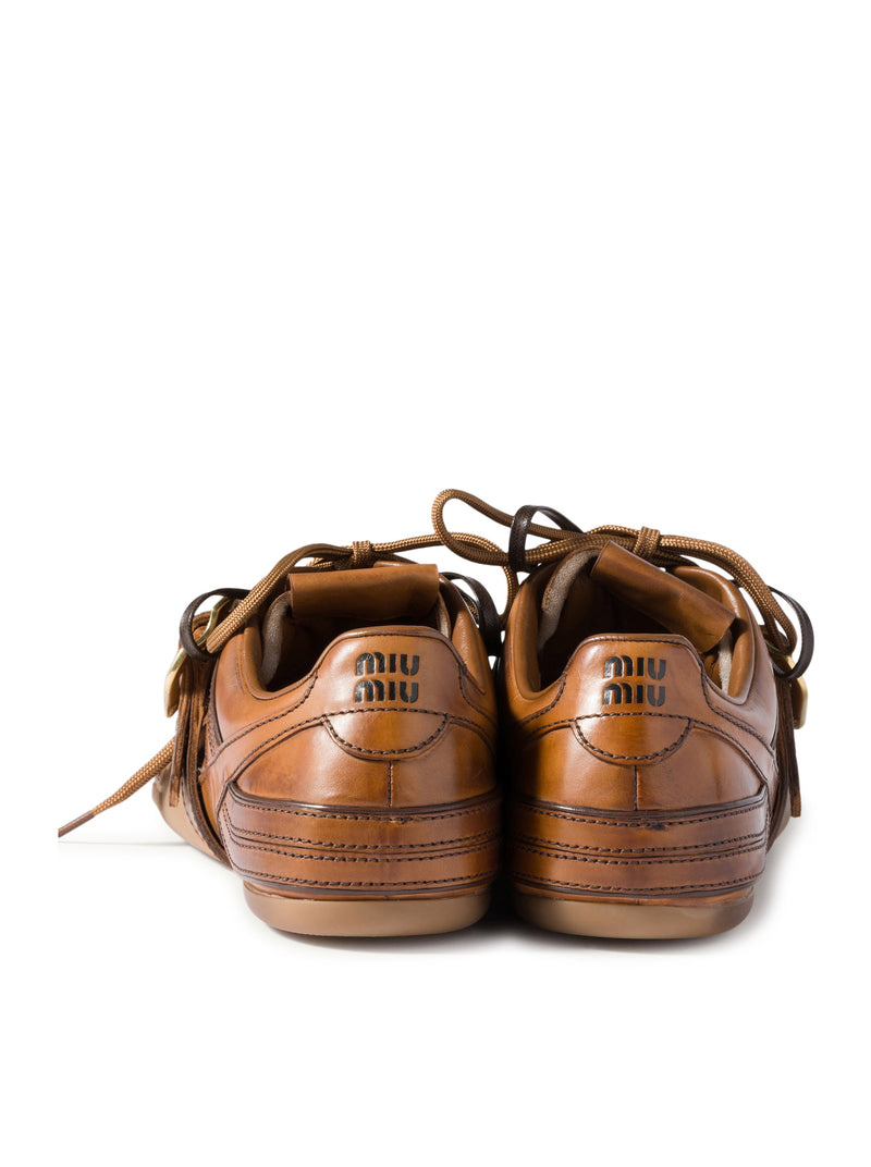 LEATHER SNEAKERS WITH BUCKLE