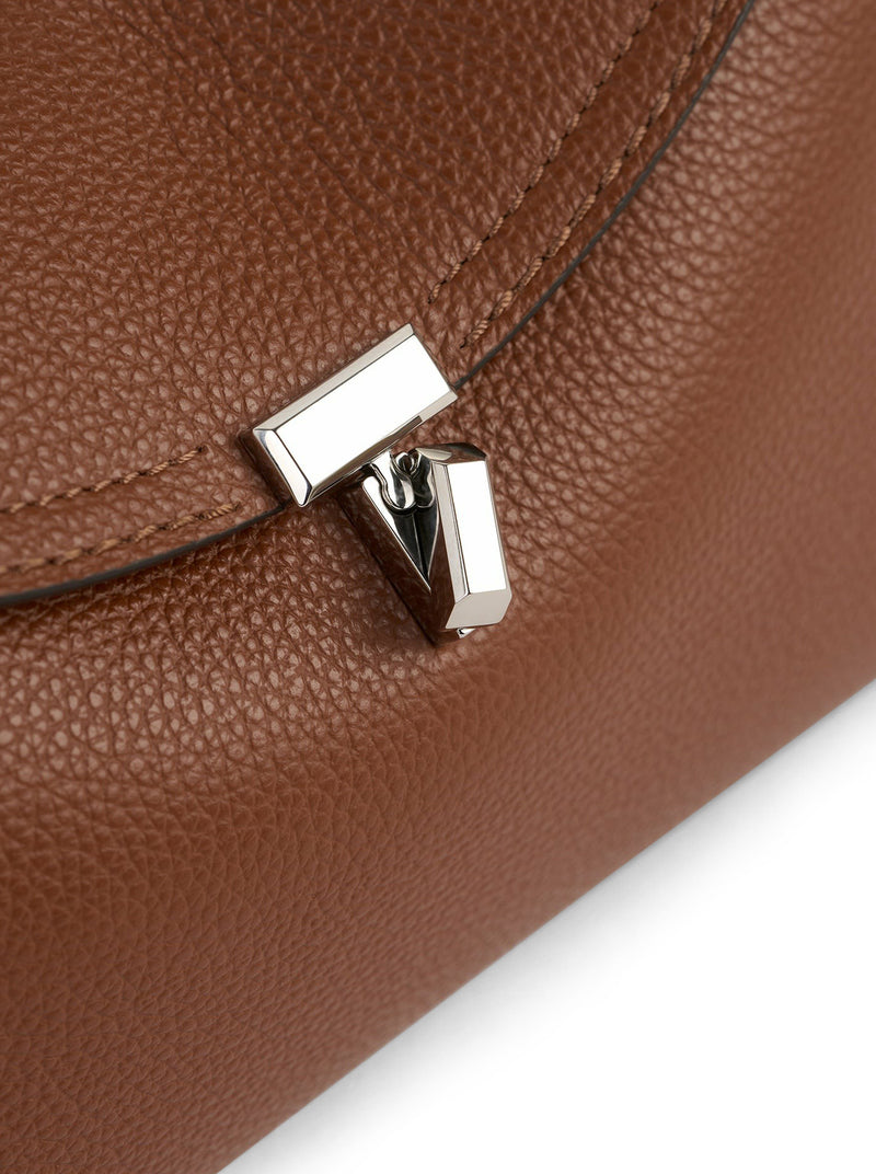 T-LOCK HAMMERED LEATHER CLUTCH