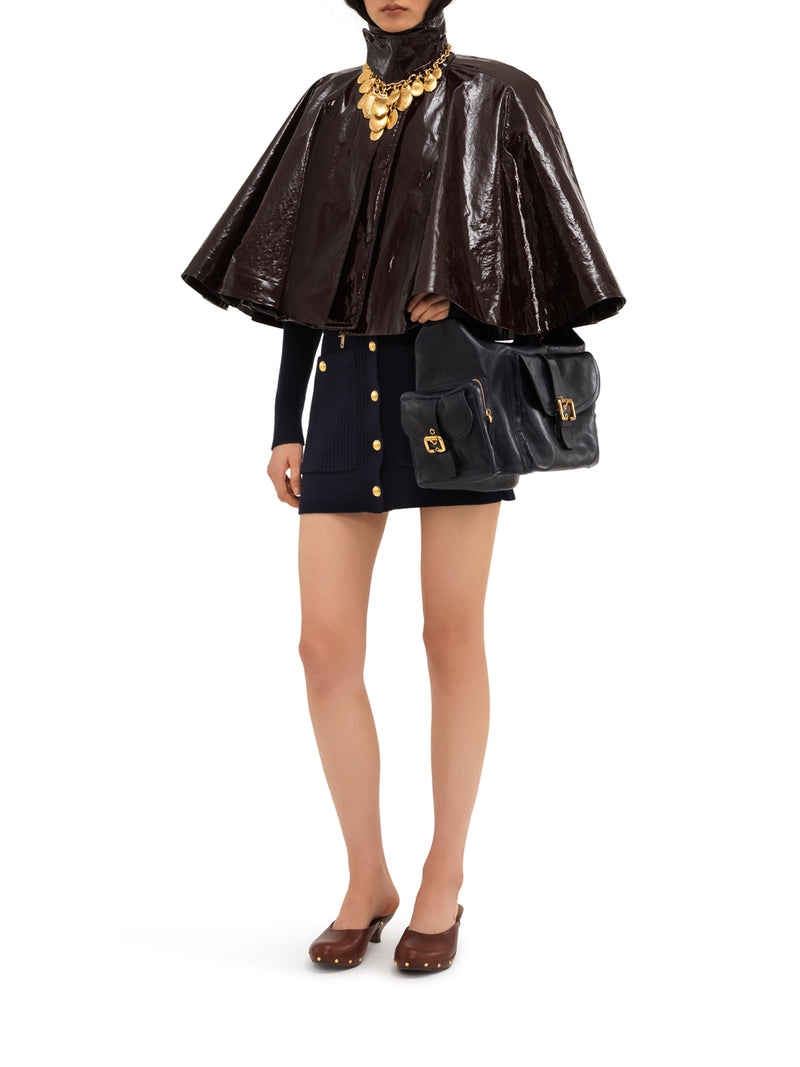 Short poncho in lacquered cotton