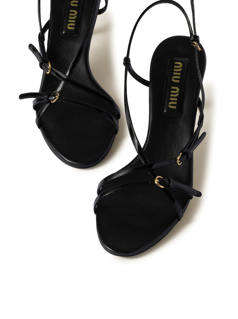 Patent leather sandals with buckles