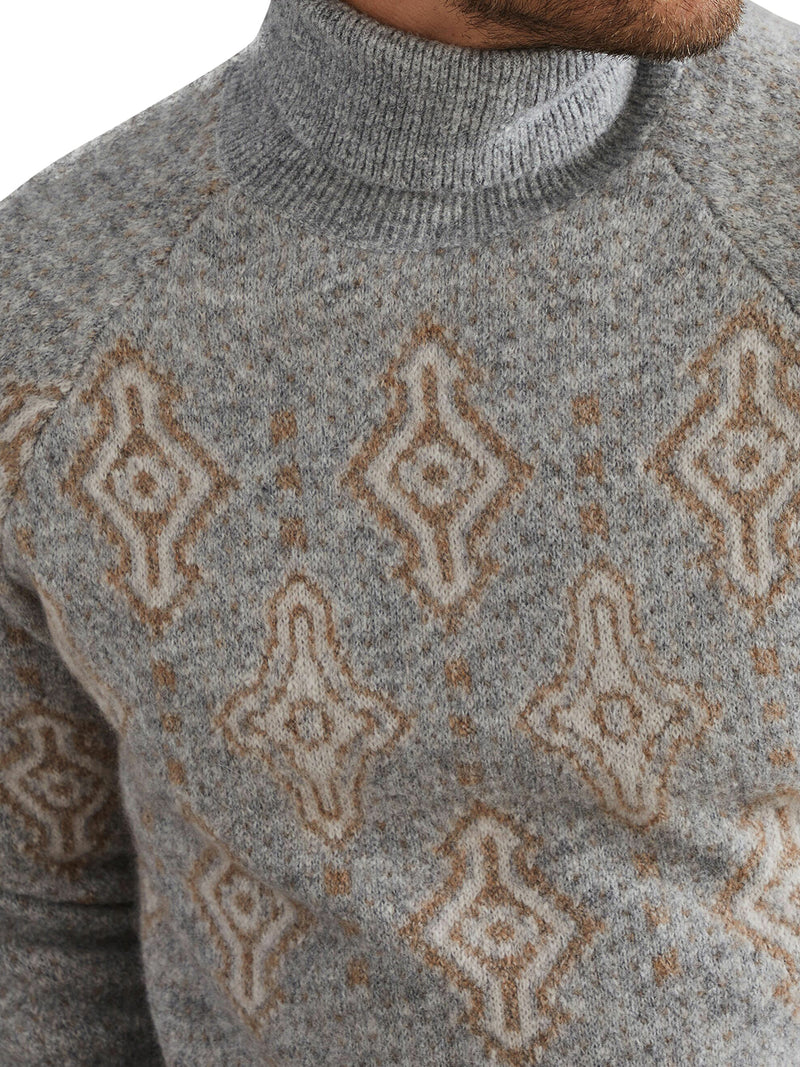 Sweater with inlays