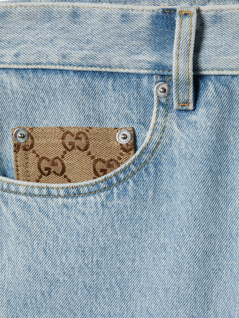 DÉLAVÉ DENIM TROUSERS WITH GG INSERT