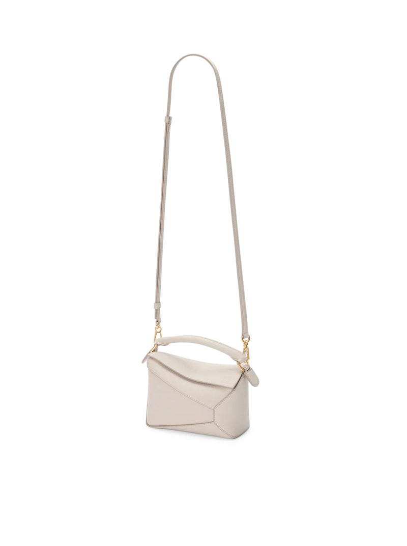 PUZZLE EDGE MINI BAG IN GRENADE LEATHER