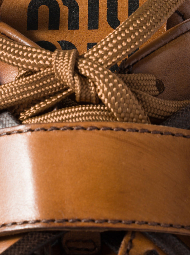 LEATHER SNEAKERS WITH BUCKLE