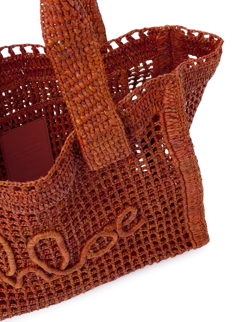 EAST-WEST SUMMER BANANA TOTE BAG IN RAFFIA